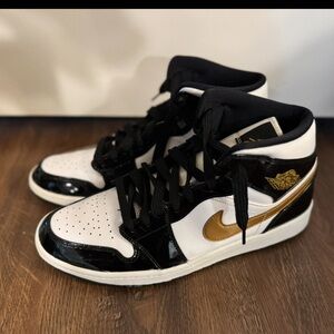 Jordan 1’s Black and Gold High-Top Sneakers